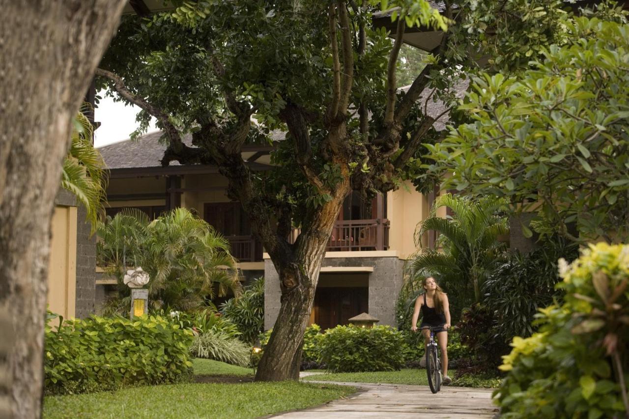 The Patra Bali Resort & Villas - Chse Certified Kuta Lombok Exterior foto A guest cycling through the resort